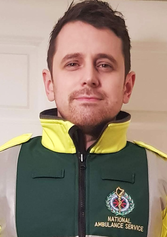 Headshot of a paramedic wearing a paramedic uniform.